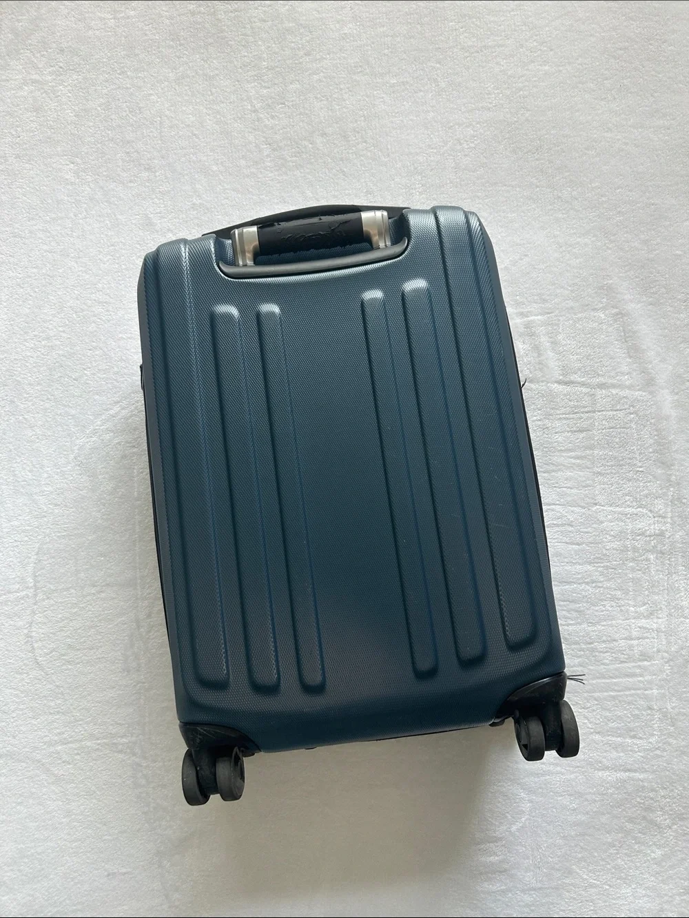 Ricardo Navy Blue Carry-On Spinner Luggage